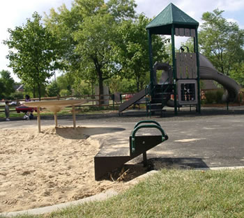 This sand play area offers an accessible sand table and a transfer system.