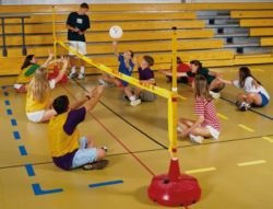 Photo of a game of sitting volleyball