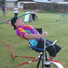 BlazeSports athlete throwing the javelin from a seated position